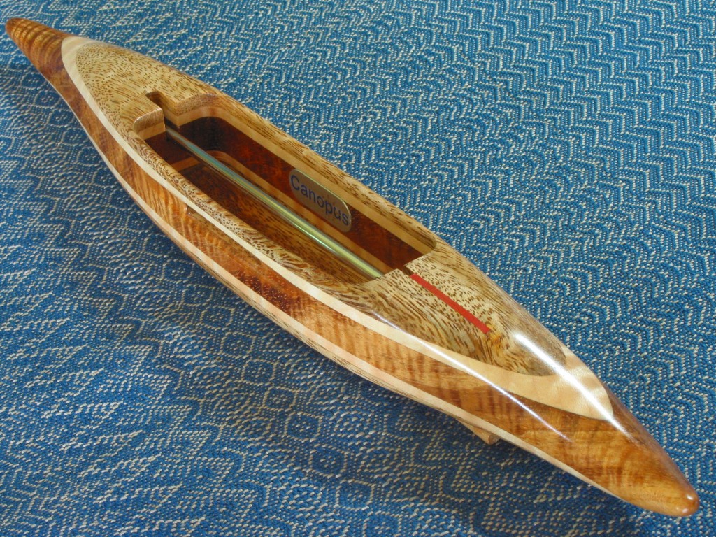 Mango and koa shuttle.  Both woods are from the island of Hawai'i where they pick up coloration from the volcanic soils