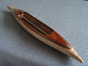 f2016koawtigrmapl12:figured koa top/bottom, black walnut 2nd layers,  tiger maple center. 3.5 oz.,12 1/2"L, 1 3/4"W, 1"H, 3 7/8" tip to nearest cavity end. Fits 4" bobbins.